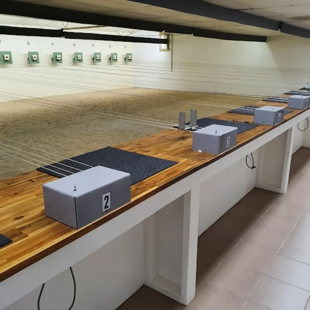 Indoor air pistol range with numbered firing points