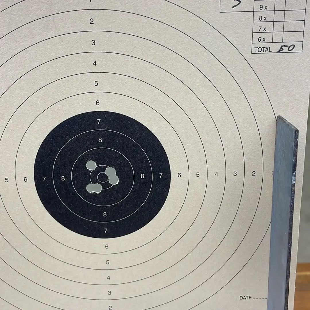 Paper target photographed after a club shoot