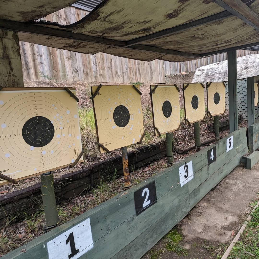 Outdoor paper targets beneath a shelter